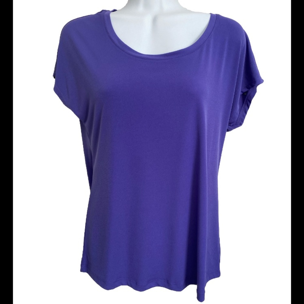 Chico’s T shirt in a size 0 or XS purple round neck rounded hemline rayon poly